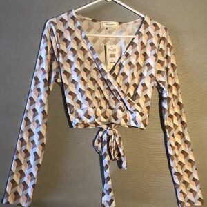 NWT No Comment L Long Sleeve Soft Stretch Geometric Wrap Top Cutout Tie